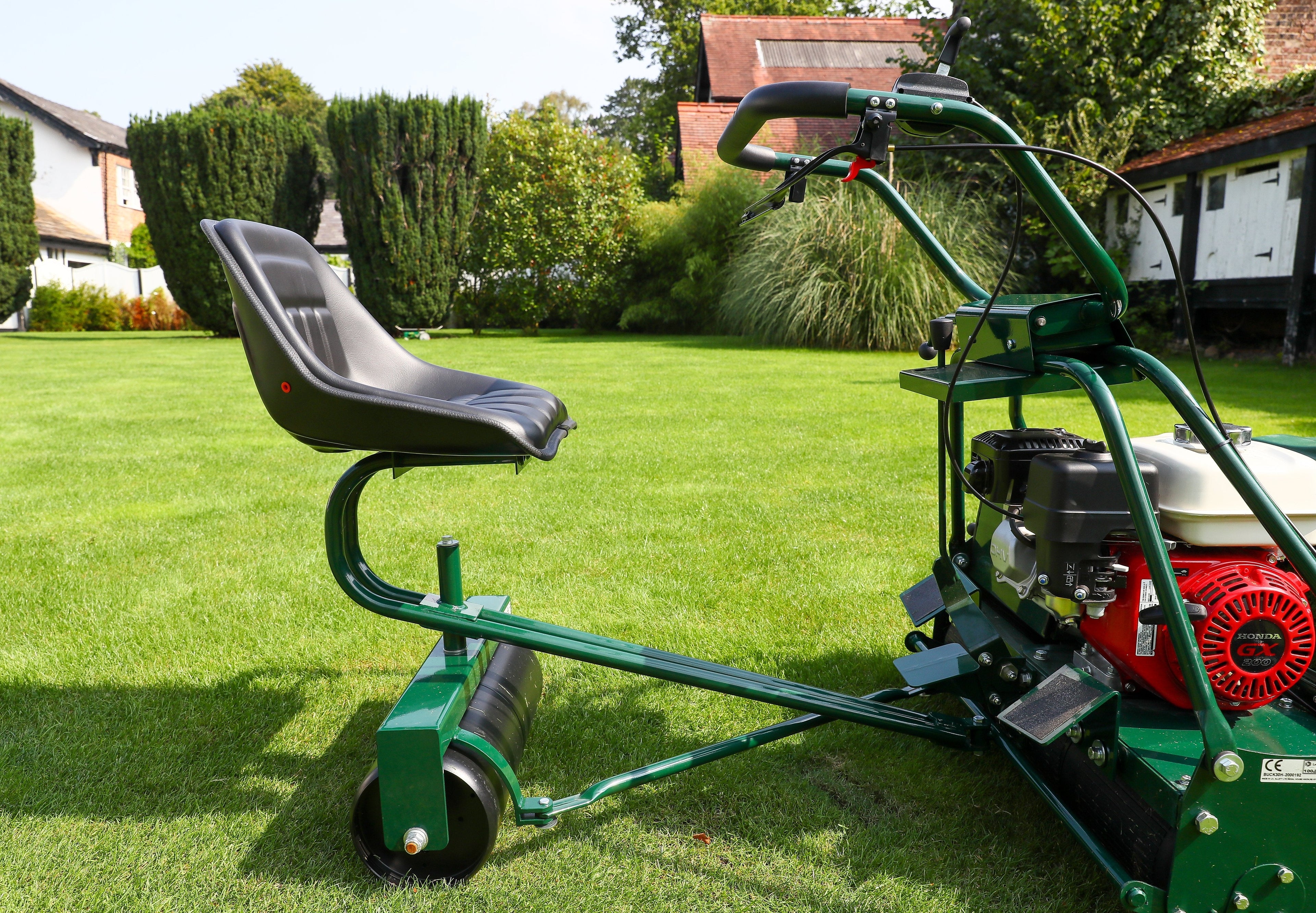 Load video: The Autosteer Trailing Seat For The Allett Buckingham Cylinder Lawn Mower